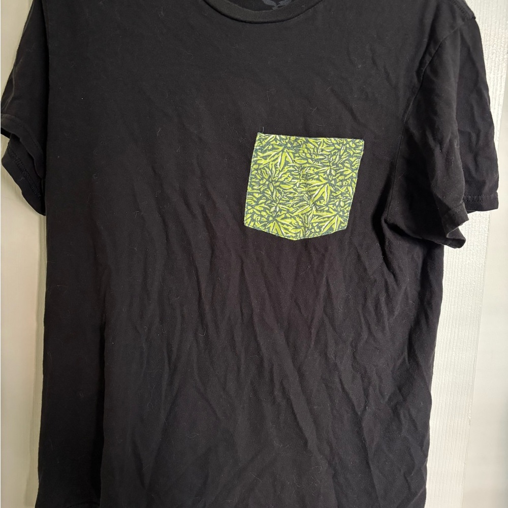RISE Dispensaries Black T-Shirt with Green Leaf Pattern Pocket